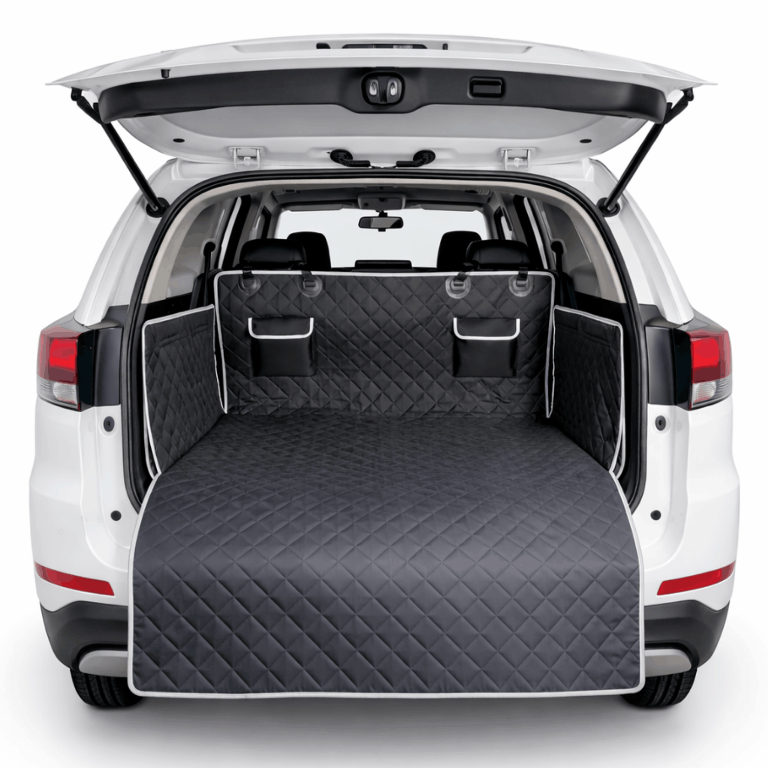 Black quilted dog blanket for the car trunk with side flaps and protective edge.