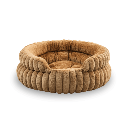 Round brown plush dog bed with raised soft edges and padded cushion center.