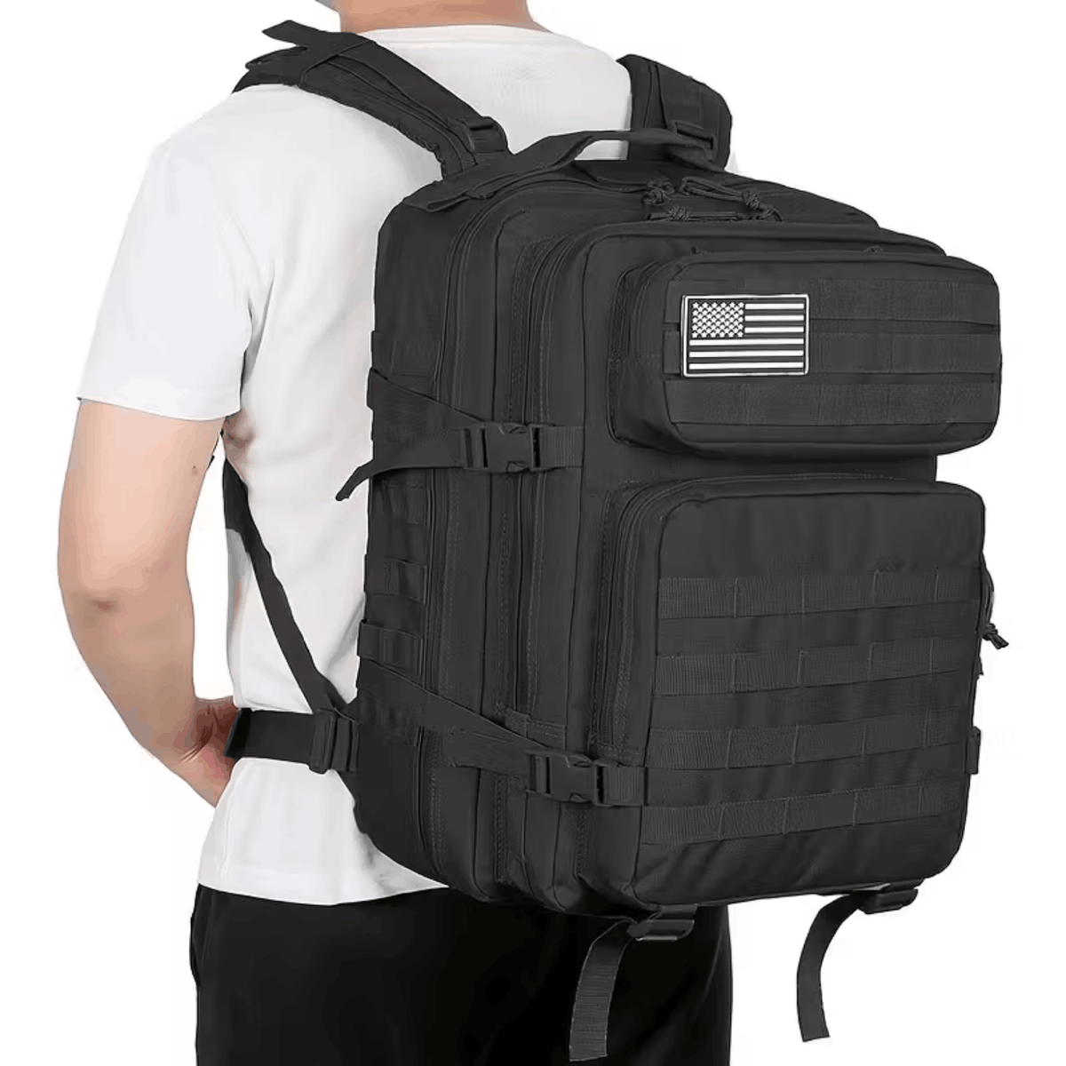 Green backpack with multiple compartments and straps, photographed from the front at an angle.