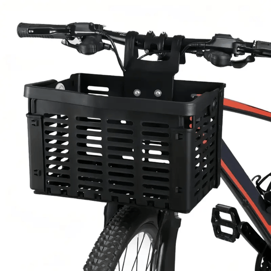 Zwarte opvouwbare kunststof fietsmand van Zyro gemonteerd aan het stuur van een sportieve fiets.